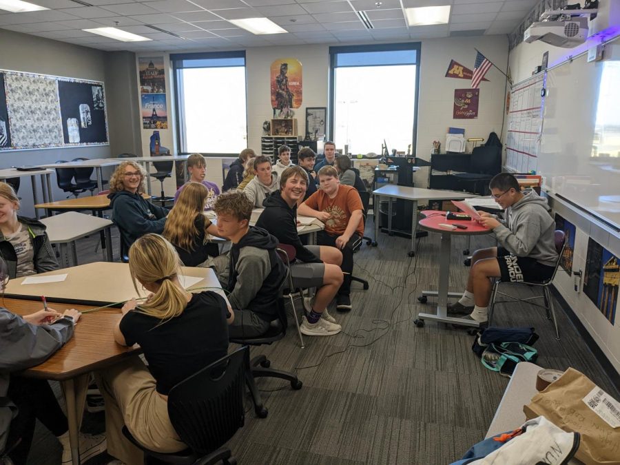 Day one of Knowledgebowl practice, with Joey Kotten reading for the room. "I enjoy Knowledge Bowl because it's a fun way to answer trivia questions with friends," Joey Kotten states.