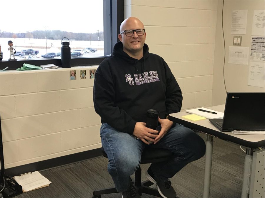 Social Studies teacher Mr. Nessler is wearing his Eagles gear for purple and white Friday