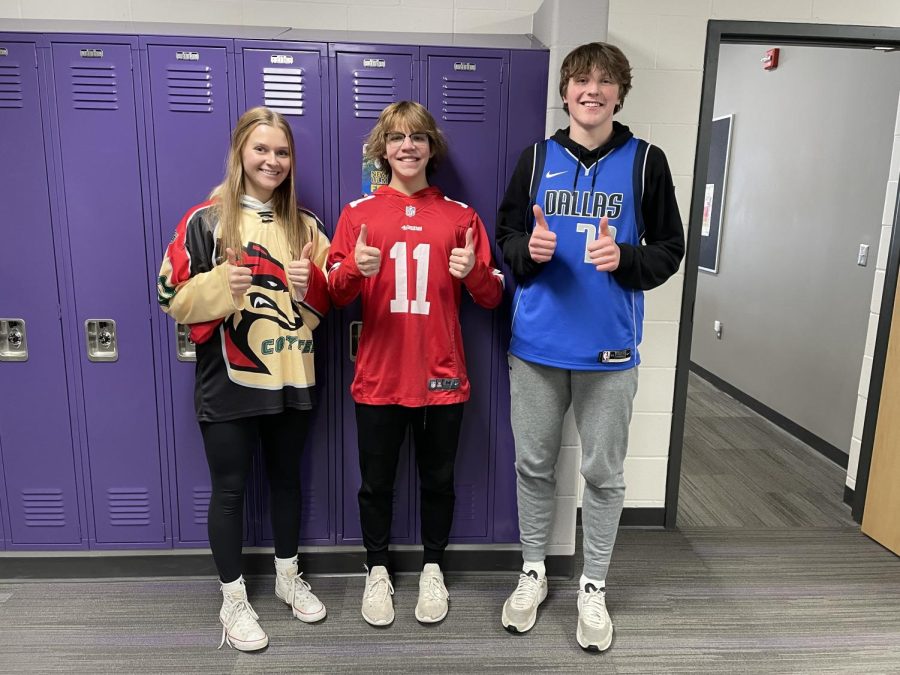 Senior Bryanna Aschenbrenne, Senior Rylan O'Neill, and Junior Colton Benson with three different sports jerseys.