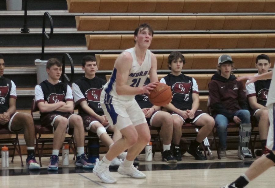 Colton Benson scores his 1000th point with a signature 3- pointer in the first half of the game on Tuesday, Jan. 17 2023 against Norwood Young America. Colton has been on a tear this year averaging 30 points and his high being 41 points. When asked about this accomplishment Benson said, " It felt really good to be apart of a small group of people in the 1000 point club." The Eagles are 12-4 on the season and have hopes of making it to state for the first time in over 30 years.