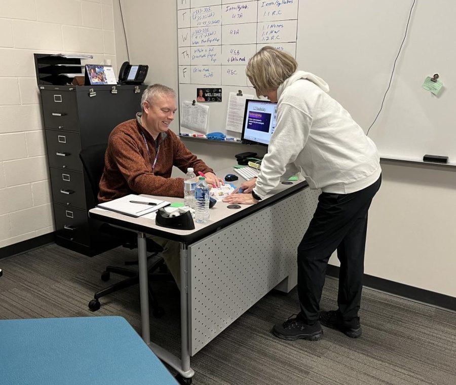 Mr. Foley and Mrs.Rogers are working hard on their lesson plans for today 