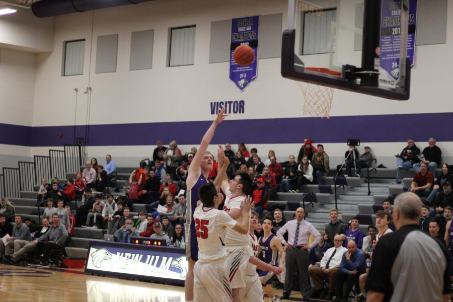 Zach Meyer shooting a buzzer-beater shot his senior year and the crowd's excitement.   