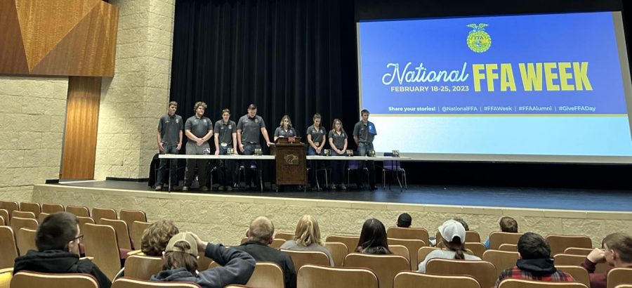 FFA officers stand while the meeting starts. Past and future information was covered this past Tuesday, January 24. The members were served pizza and pop to follow the meeting and were then released to watch the basketball game. "Ethan Dake says, the meeting was very good and I enjoy seeing our members."