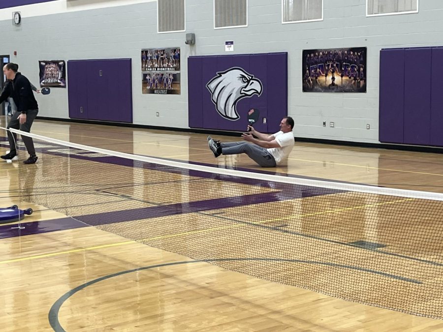 Mr. Bergmann goes all out for the win in the second round of the pickleball tournament. Mr. Bergmann and Mr. Lieser are the team to beat in this year's tourney.