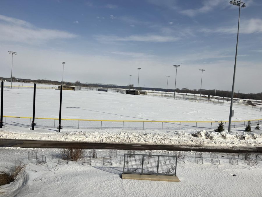 New Ulm High School's softball and baseball fields are piled up with snow in the middle of March