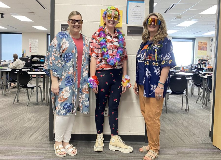 Rockin' the tropics: Mrs. Marlowe, Lexi Schneider and Mrs. Nelson bringing their A-game on Snow Week dress-ups days.