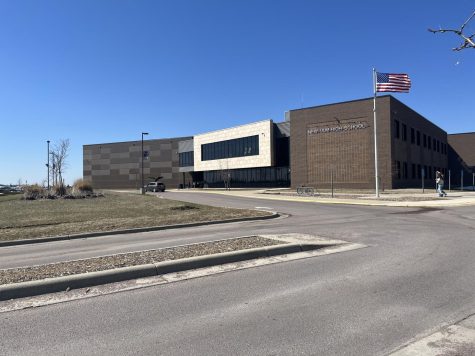 Picture of the school taken on a warm open lunch hour.