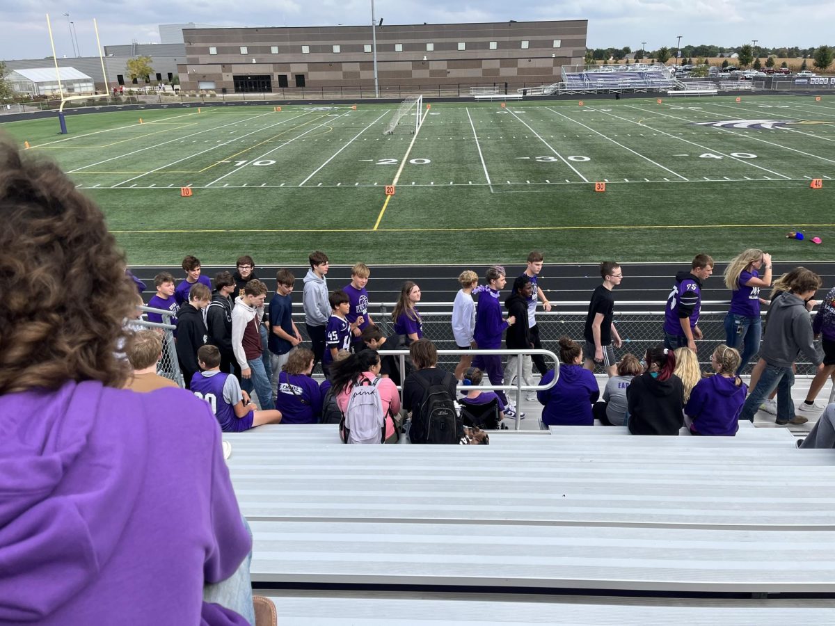 Students gather into the grand stands for the schools annual pep fest.