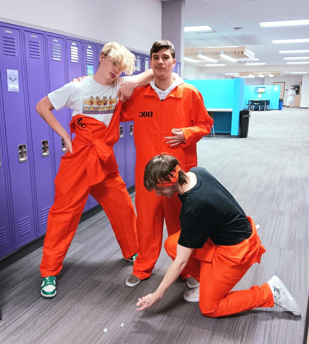 New Ulm Students Tallak Rakowski(left), Kyle Helget(middle), and Chase Seifert(right) dress up in their Halloween outfits claiming "we escaped last week" 