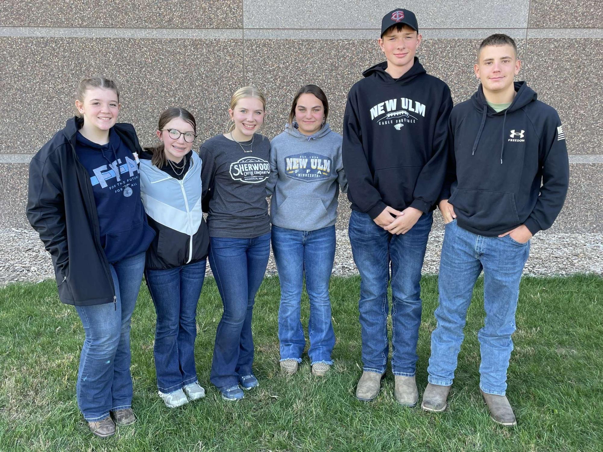 Left to right JV members Natalia Frederickson, Varsity member's Kate Schmidt, Aubree Schmidt, Zelli Kamm John Sondag, and Kaden Wilson