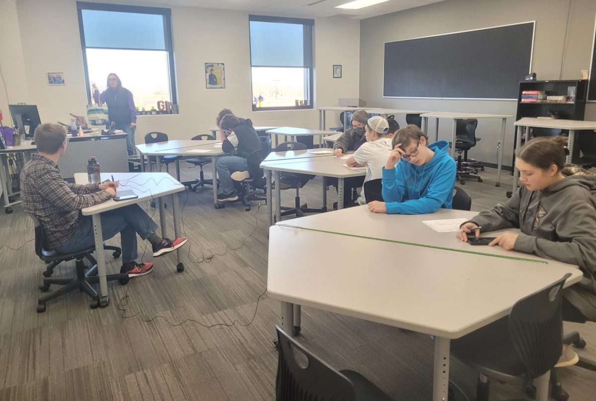 Knowledge Bowl members practice in Mrs. Gordon's room in the Social Studies/History hall with Mr. Graham at the helm right after school on Friday until 4 P.M.