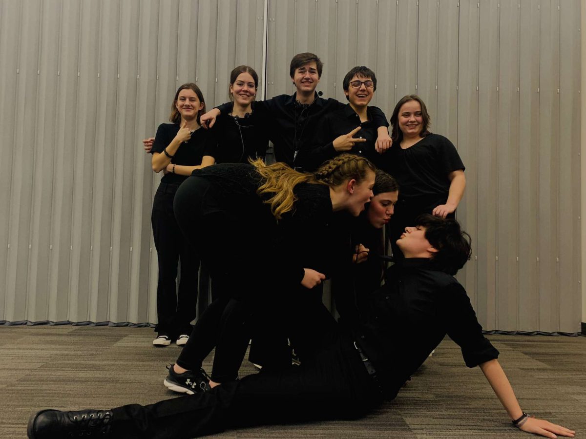 The stage crew's last few moments before the final performance of the Hunchback of Notre Dame.