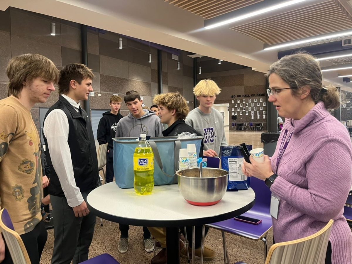 Students try out new foods like soup, pop, sour treats, and chips from Mexico