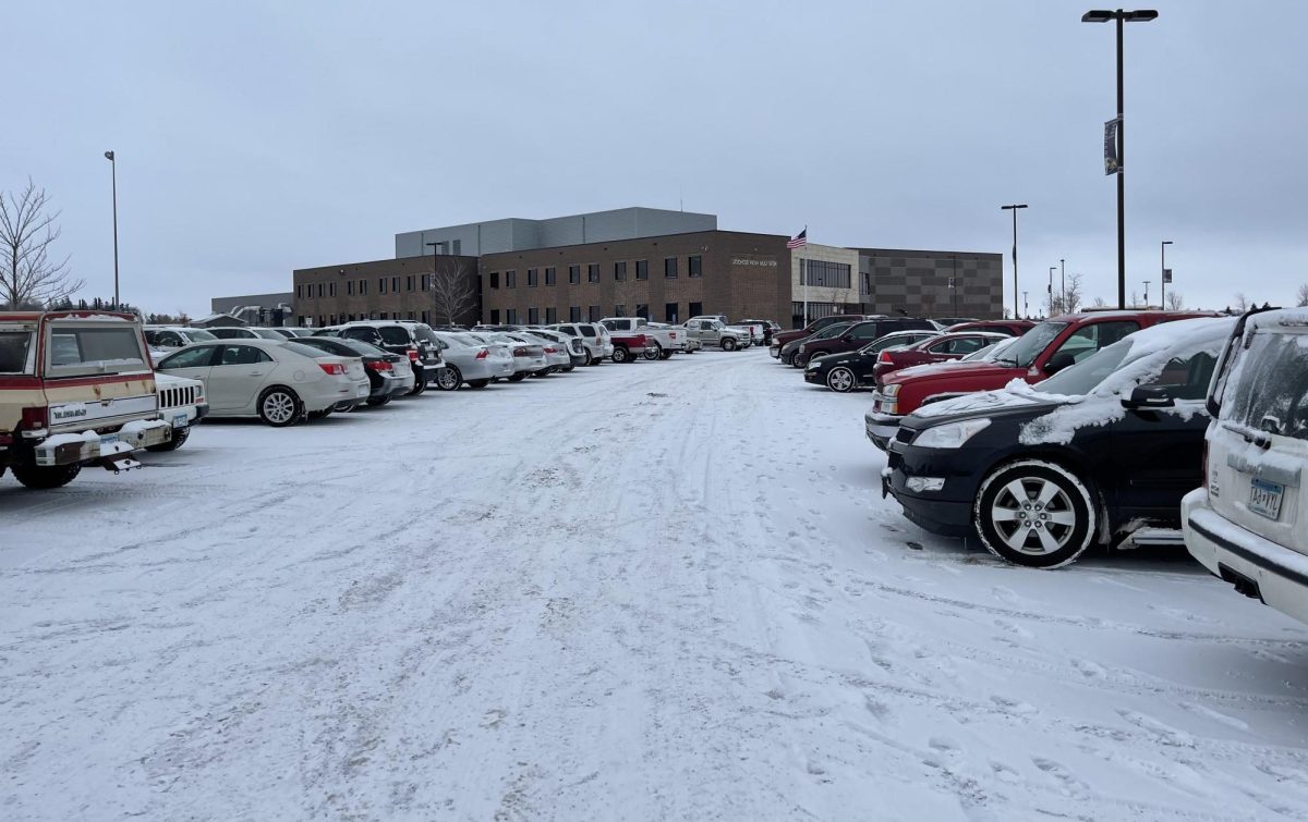 New Ulm Eagles first time in the snow this year. The snow makes it difficult to park because  the lines aren't visible. Everyone did the best they could though, this being the first snow.