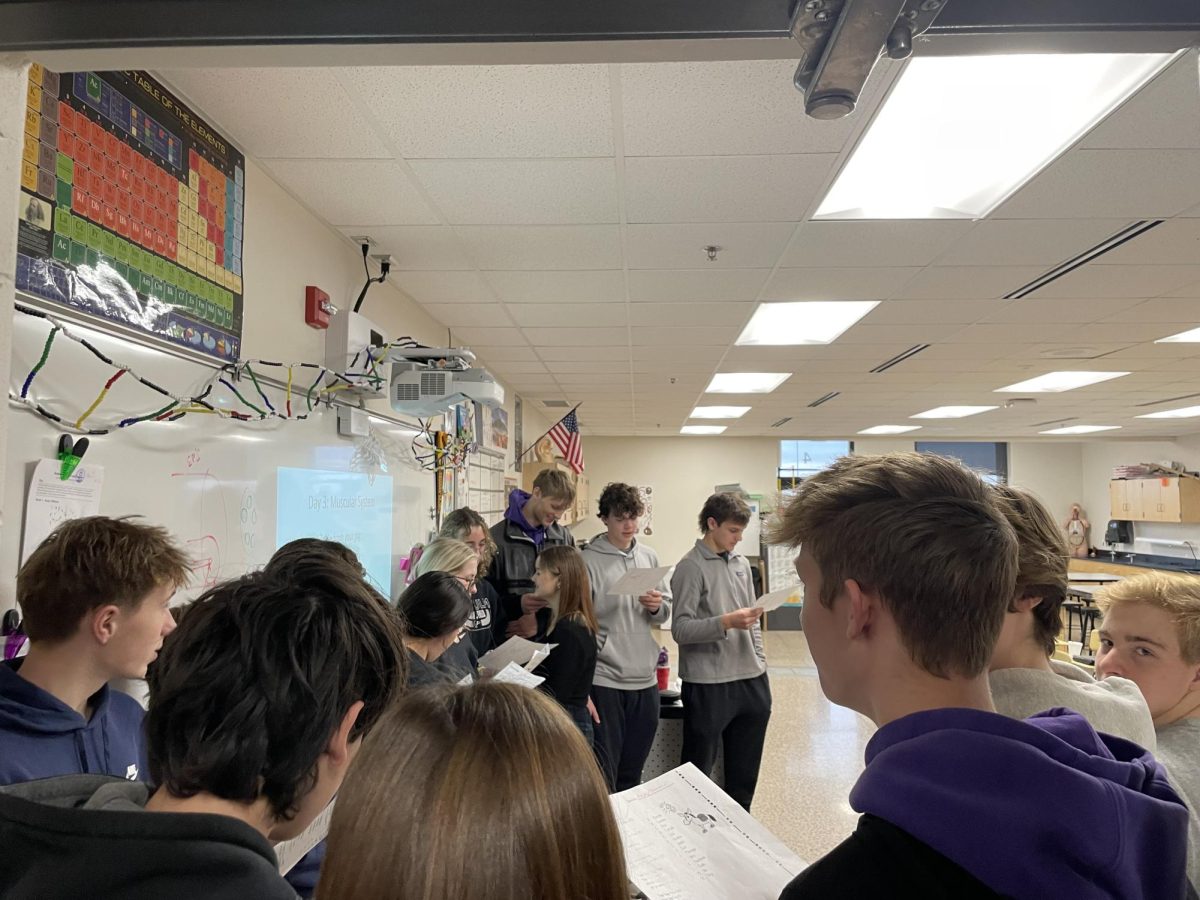 students caroling in Mr. Nelsons class