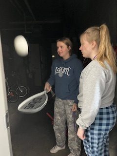 Seniors Taylor Haustein (left) and Isabelle Fuhr demonstrate their sweet skills by the NUHS gym.