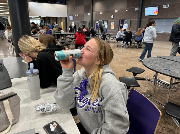 At lunch Maddi Olsen is drinking a bubbl'r with her friends. "I love having lunch with my friends," Maddi Olsen said. "But I can't wait to be able to have open lunch."
