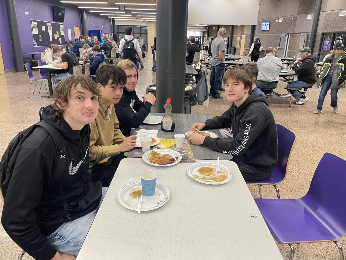 New Ulm high school students enjoying the FFA pancake breakfast 