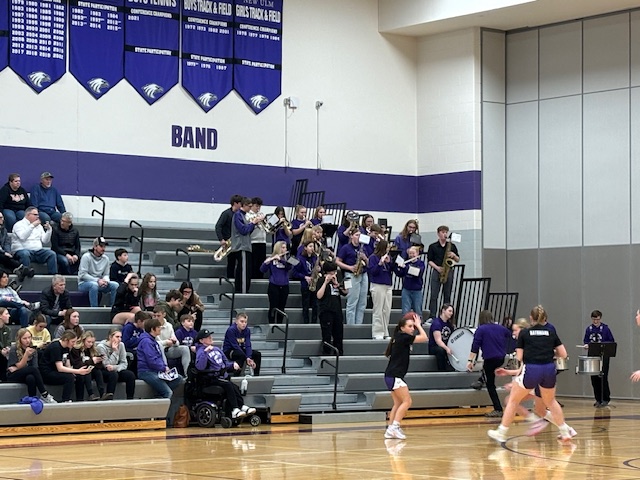 NUHS Pep Band playing for the girls basketball game