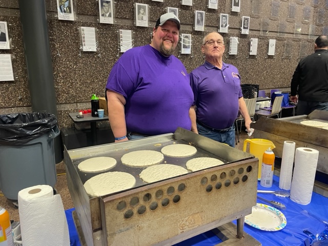 Two workers from Hub Club: Garrett Freeman (left)and Doug Schottle.