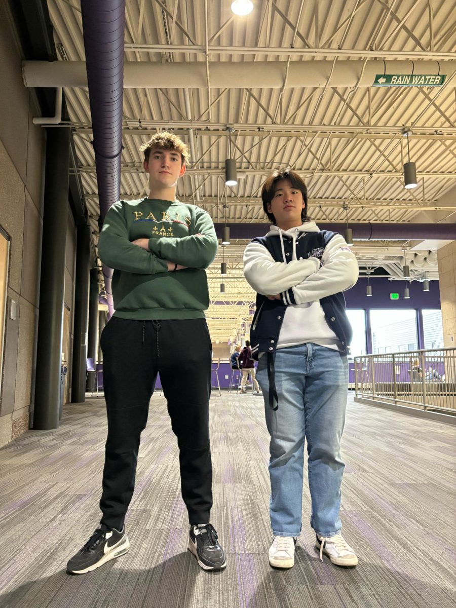 Ben Groebner (left) and Sam Chalakov (right) wear London and Paris gear.