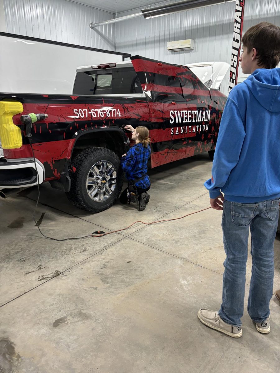 Wrap for Sweetman Sanitation being put on a truck