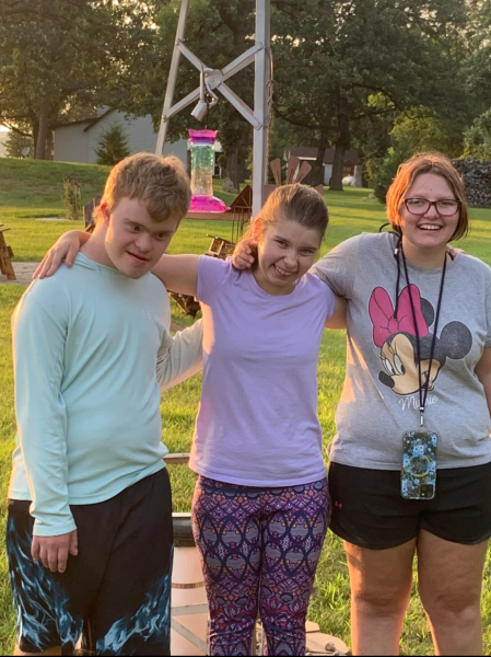 Junior Bryce Braulick, Senior Jenna Jay, and Senior Jaida Fromm pose for a picture after a day of fun outside. 