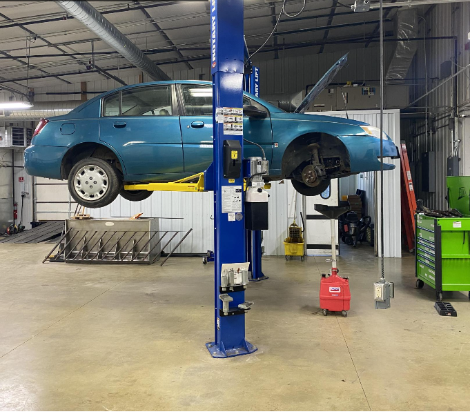 A students car getting engine worked on