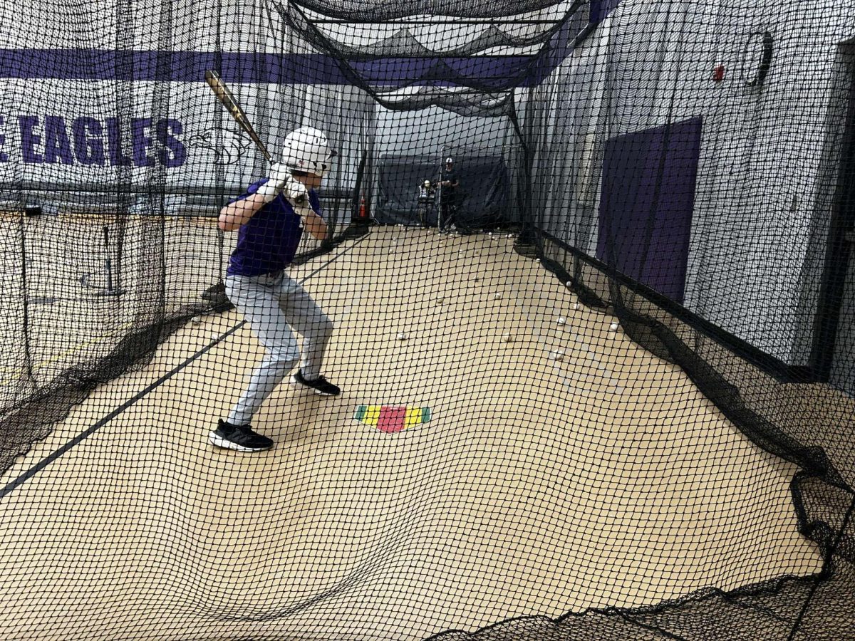 New Ulm's Dirk Haynes steps up in the batting cage