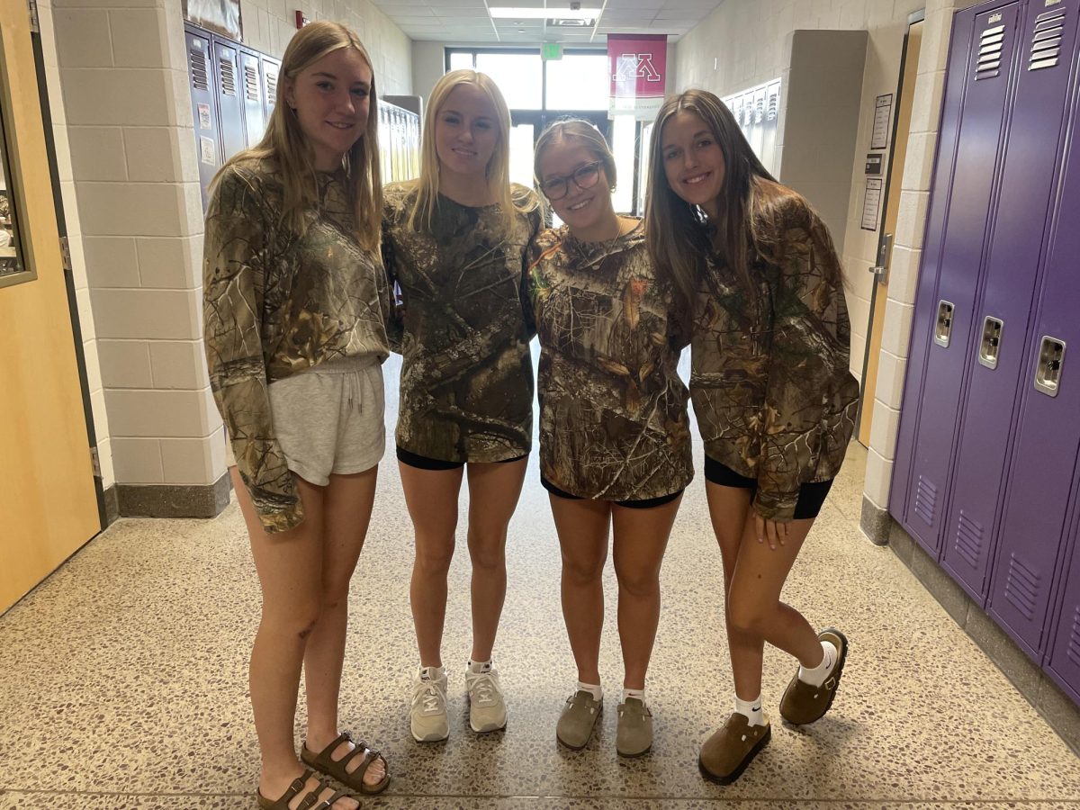 Upperclassmen (L to R) Makena Meier, Brooklyn Lewis, Noelle Hauge and Avary Rogier are showing off the camoflauge spirit.