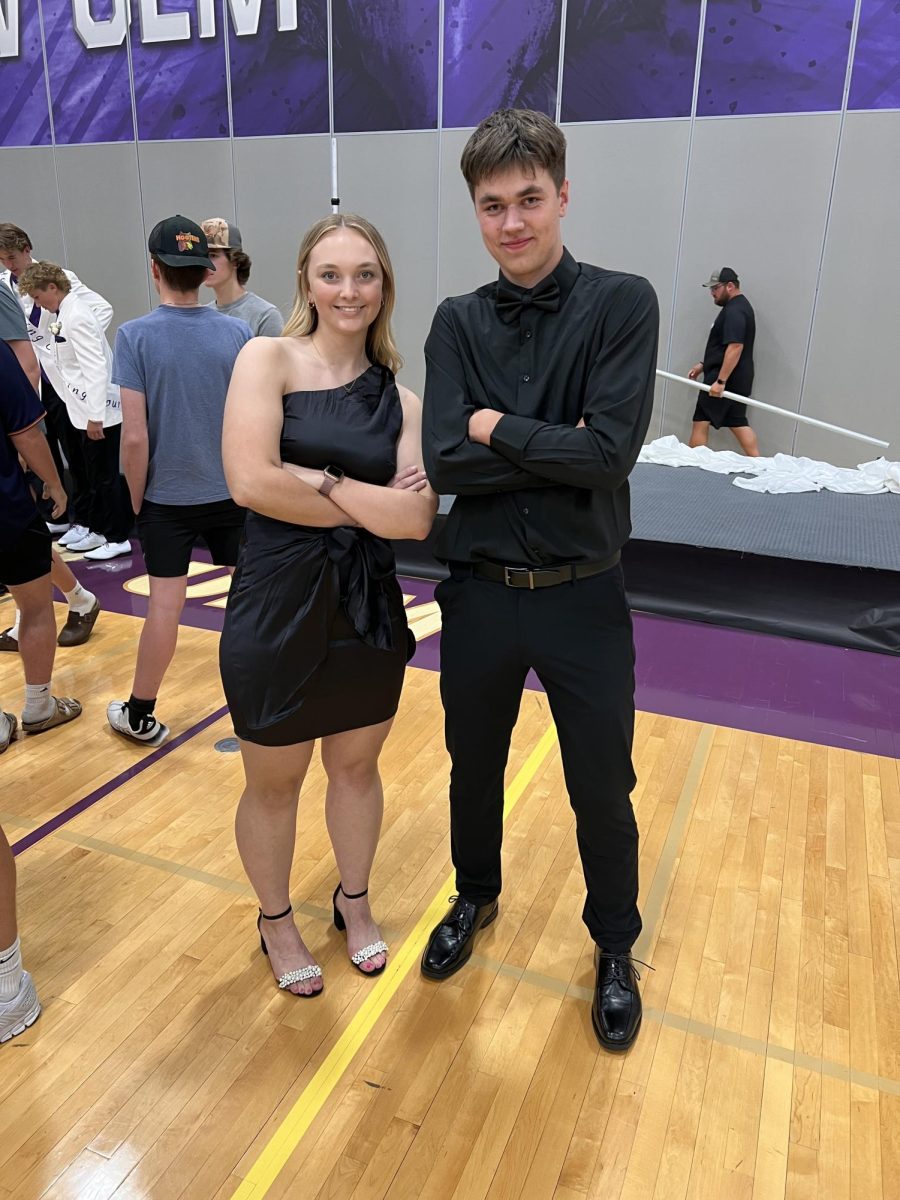 Homecoming escorts Madilyn Portner and Nick Risen get together after Coronation to take some photos.