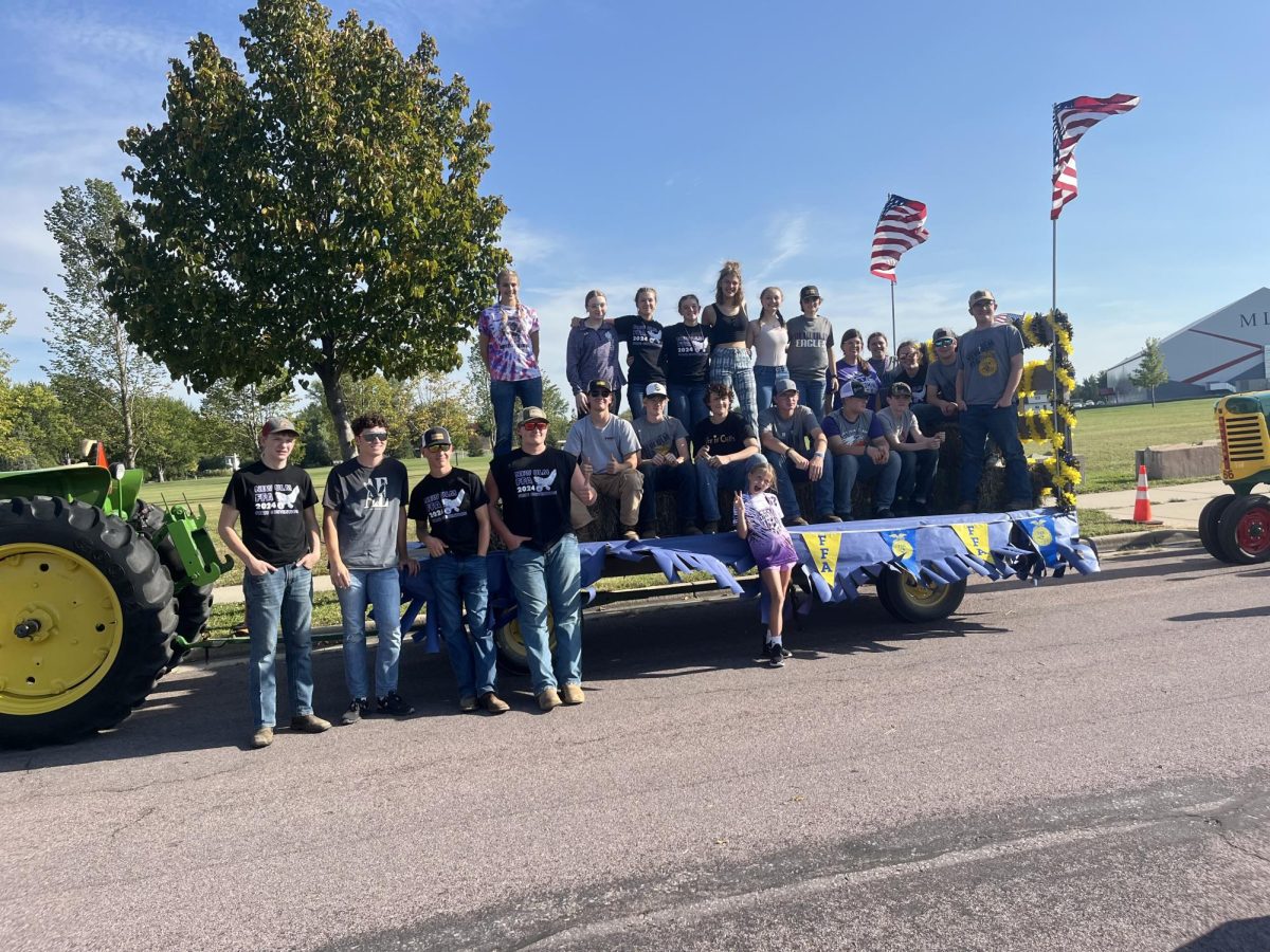 FFA members ready their float for the homecoming parade. John Smith donated his trailor to help carry all the members. "Super psyched to be able to help," Smith said.