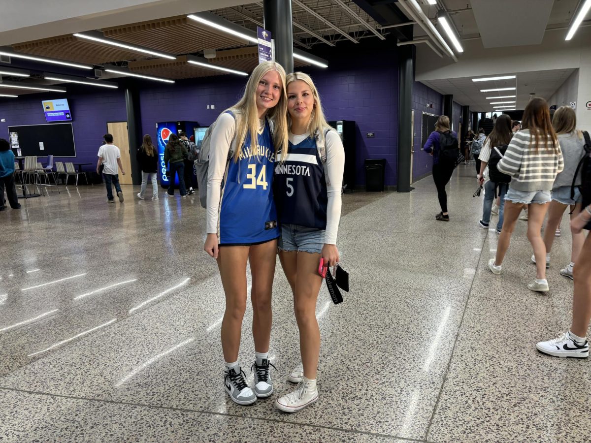 Juniors Lily Mathiowetz and Riley Wilson are showing off their jerseys for the first day of homecoming week. 