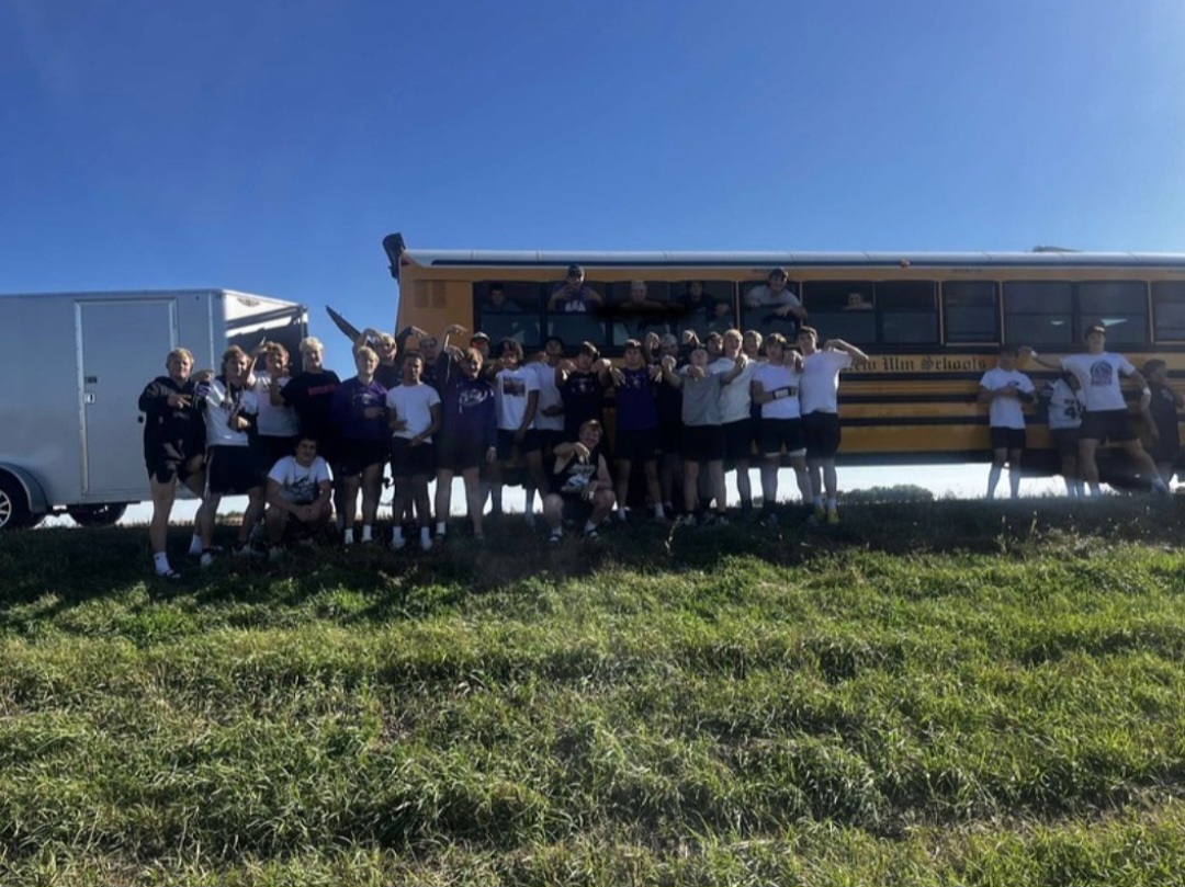 The football team waiting for some roadside assistance after the bus broke down on their way to Worthington. 