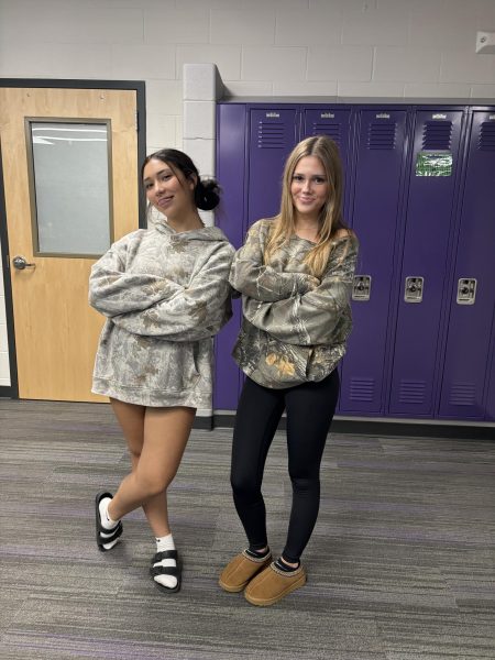 Juniors Hailee Christensen and Breanna Haala dressed up for camouflage day 