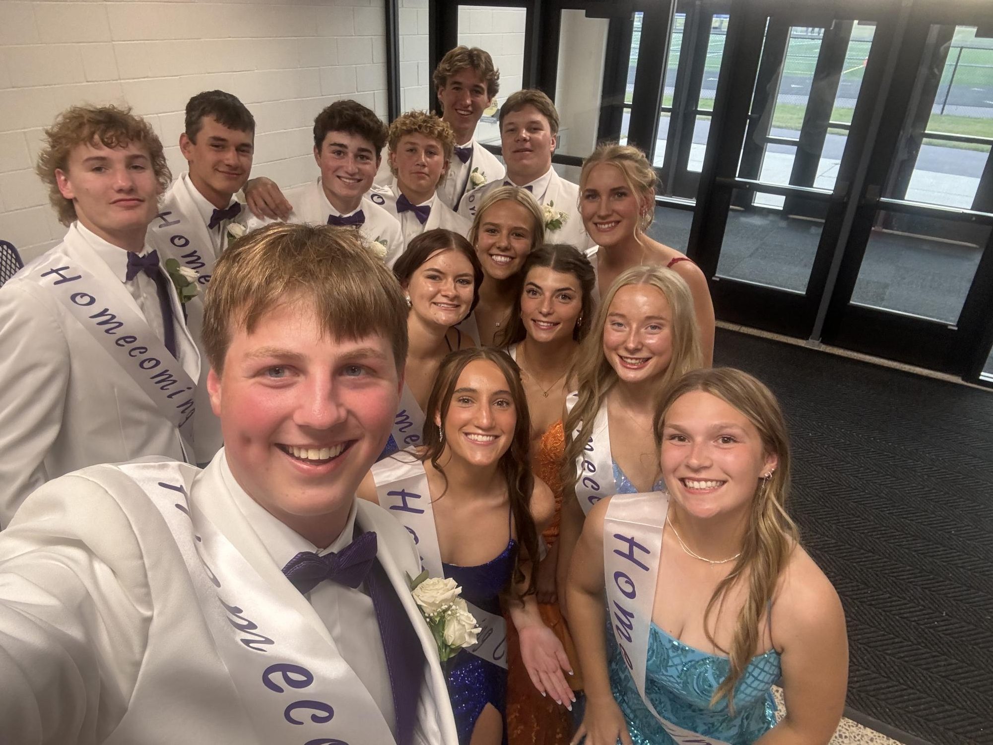 2024 NUHS homecoming court gathers shortly before coronation ceremony.