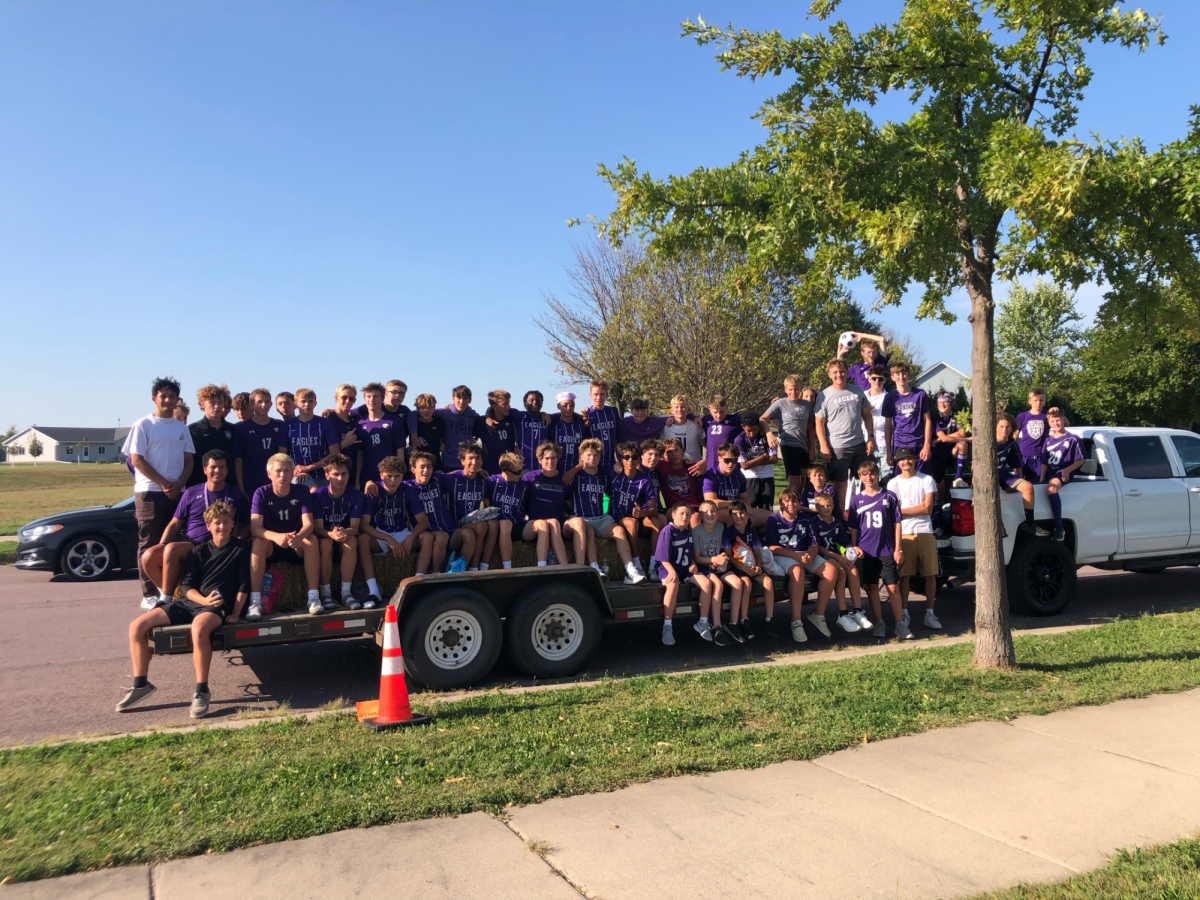 the soccer team waiting for the parade to start (Varsity, Jv, C-squad)