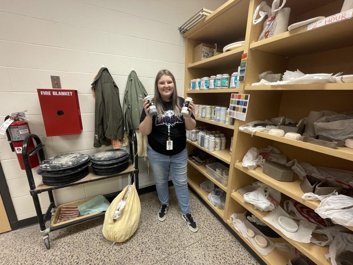 Ms. Page with her new glazes for the classroom