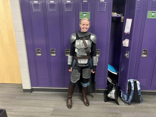 Junior Sophia Berger dresses to impress for NUHS Halloween costume contest.