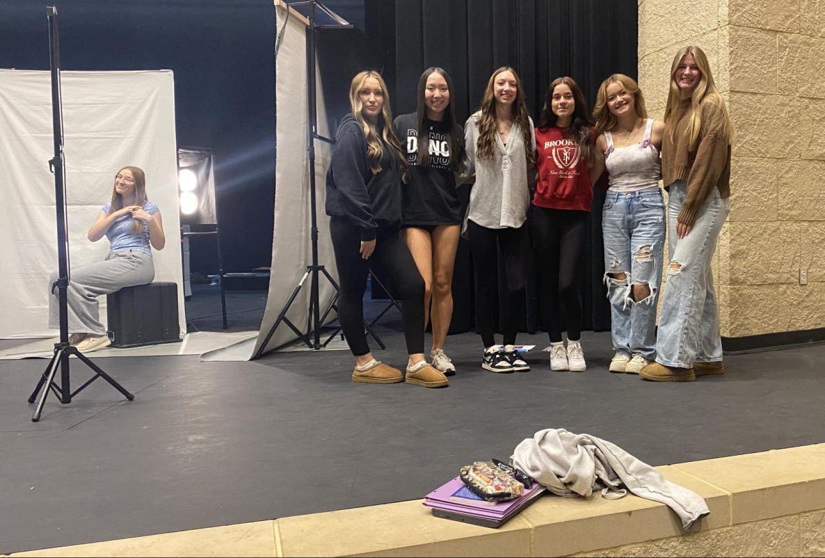 Smiling for the camera are juniors (left to right) Bronwyn Schlagel, Hailey Abraham, Bridget Bushard, Brelynn Schmid, Ariana Martinez, Lola Lueth and Lydia Osborne.