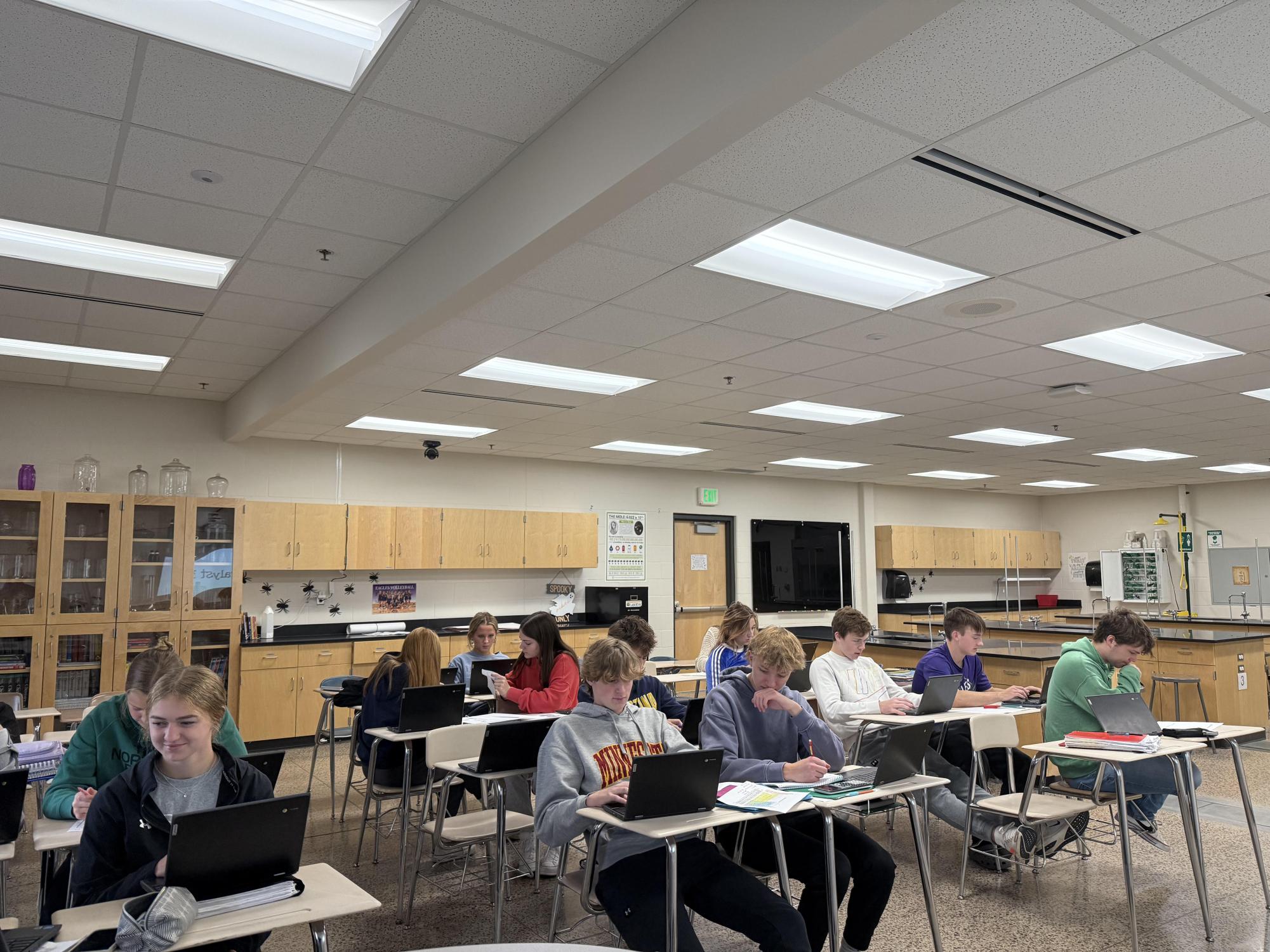 Junior students in second hour chemistry working to desigin and create their periodic tables. 