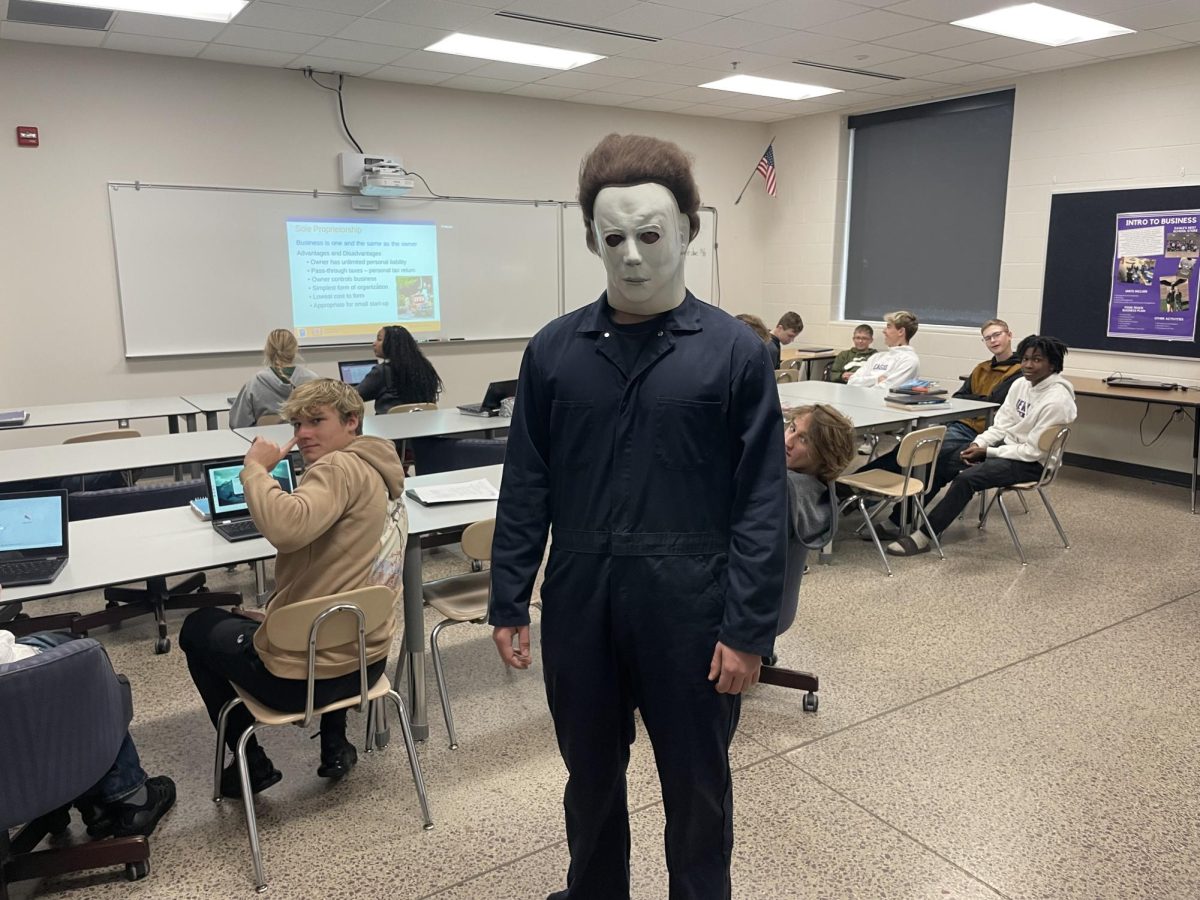 Brooks Miner dresses up as Michael Myers for Halloween. 