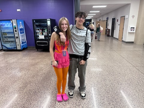 Juniors Mallory Larson and Landon Schweiss match as Lava Girl and Shark Boy for Halloween. 