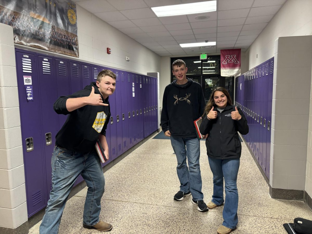 FFA officers (from left) Logan Platz, John Sondag, Zelli Kamm wait for the FFA meeting.