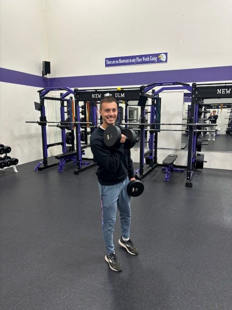 NUHS Phys Ed teacher Hunter Rodriguez poses in his "Millennial Gym Teacher" costume on Halloween.