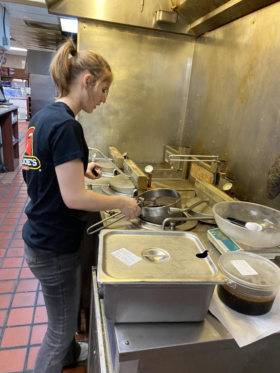 Hannah Norway working in kitchen at Happy Joe's