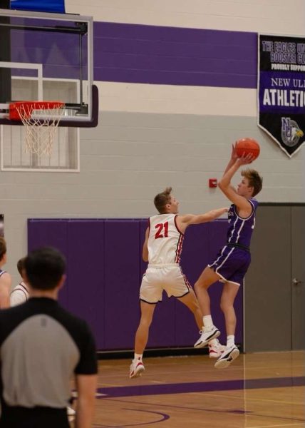 Junior Brady Dennis goes up for a layup 