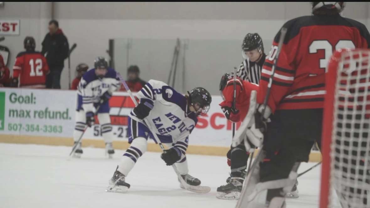 Senior Brecken Neuman looking to control the drop of the puck against the  Redwood Valley center.