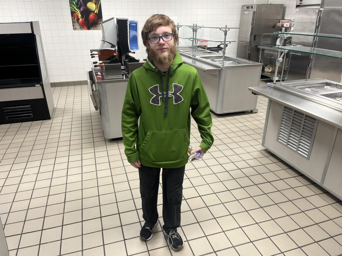 Beautiful bearded boy gets breakfast before school