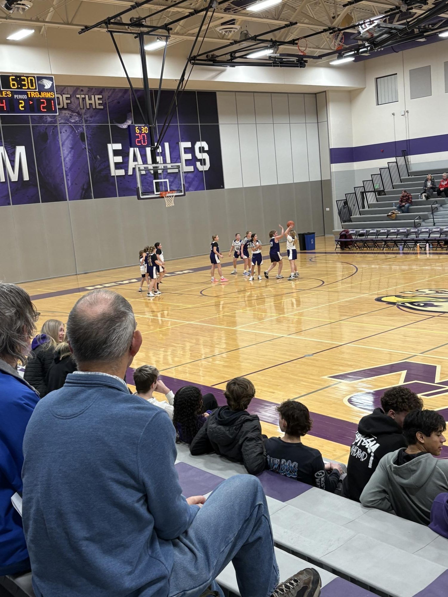 The 5th grade girls shooting baskets during the varsity halftime show. 